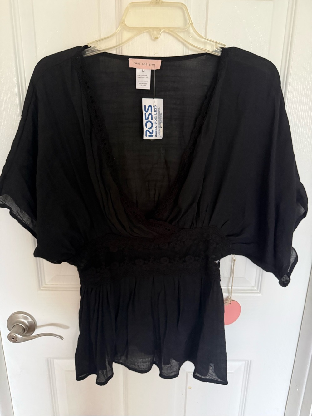 Black sheer v-neck blouse with lace waist